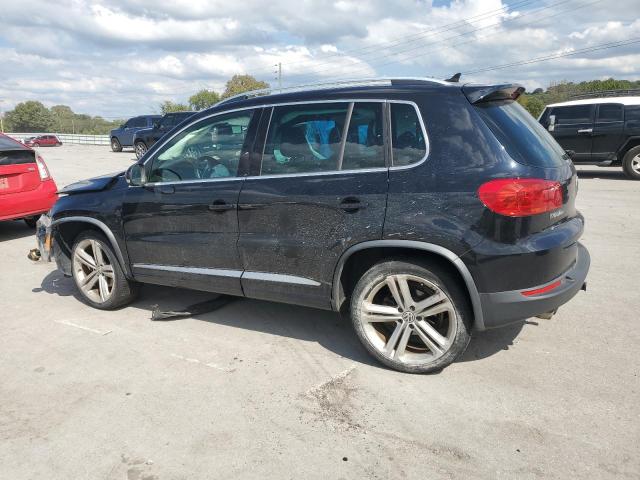 WVGBV3AX2EW031578 - 2014 VOLKSWAGEN TIGUAN S BLACK photo 2