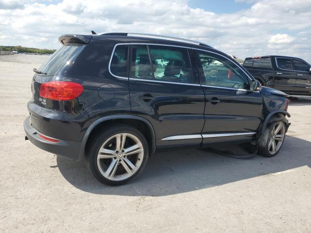 WVGBV3AX2EW031578 - 2014 VOLKSWAGEN TIGUAN S BLACK photo 3