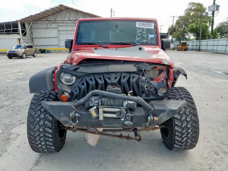 1J4BA3H14BL504826 - 2011 JEEP WRANGLER U SPORT Rot Foto 5