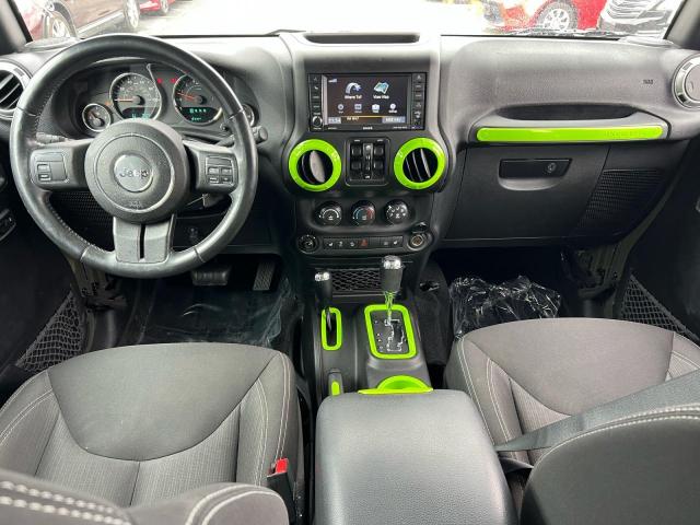 1C4BJWEG2FL770349 - 2015 JEEP WRANGLER U SAHARA მწვანე ფოტო 9