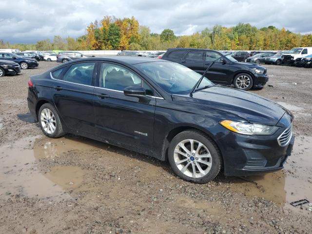 3FA6P0LU8KR220869 - 2019 FORD FUSION SE Noir photo 4