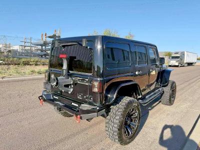 1C4BJWDG1DL515903 - 2013 JEEP WRANGLER U SPORT BLACK photo 4