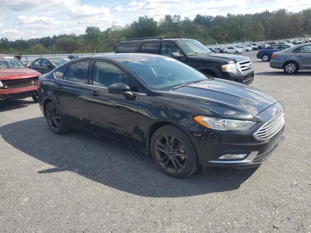 3FA6P0H99JR220253 - 2018 FORD FUSION SE BLACK photo 4