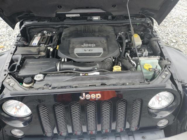 1C4BJWEG2EL142631 - 2014 JEEP WRANGLER U SAHARA BLACK photo 12