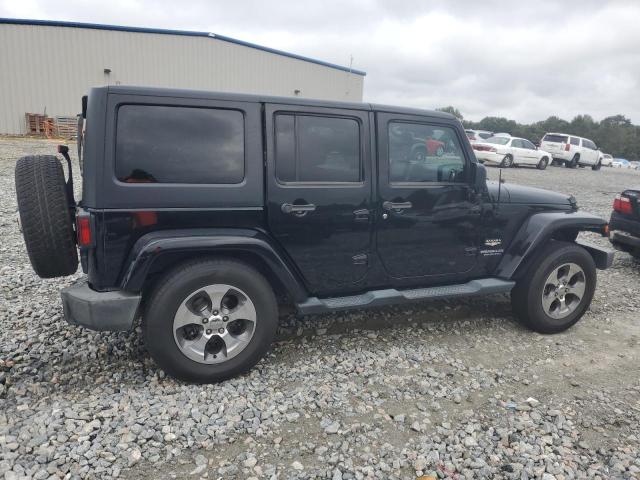 1C4BJWEG2EL142631 - 2014 JEEP WRANGLER U SAHARA BLACK photo 3