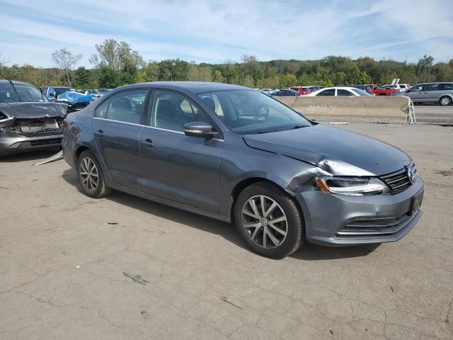 3VWDB7AJ3HM367377 - 2017 VOLKSWAGEN JETTA SE GRAY photo 4