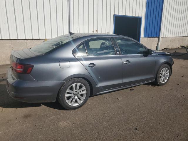3VWDB7AJ1HM391158 - 2017 VOLKSWAGEN JETTA SE GRAY photo 3