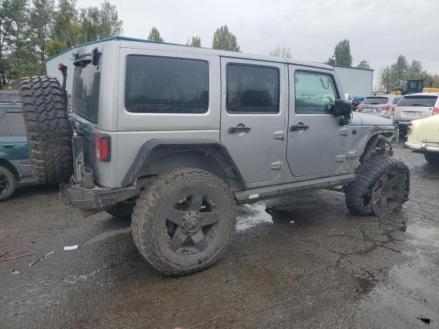 1C4BJWEG5EL144664 - 2014 JEEP WRANGLER U SAHARA GRAY photo 3