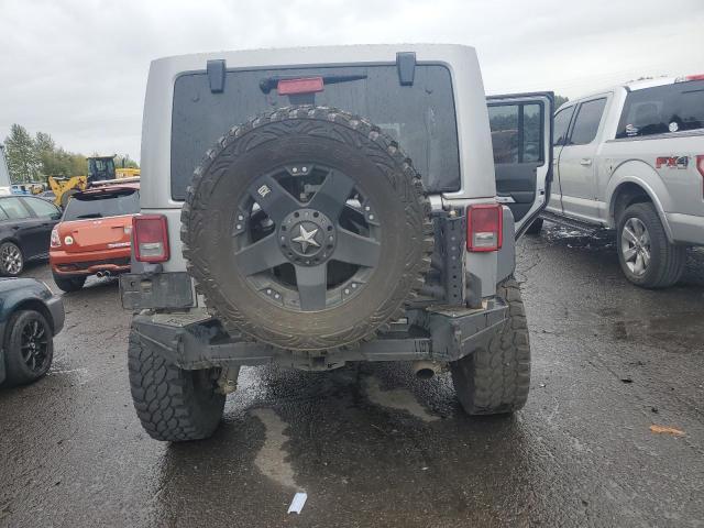 1C4BJWEG5EL144664 - 2014 JEEP WRANGLER U SAHARA GRAY photo 6