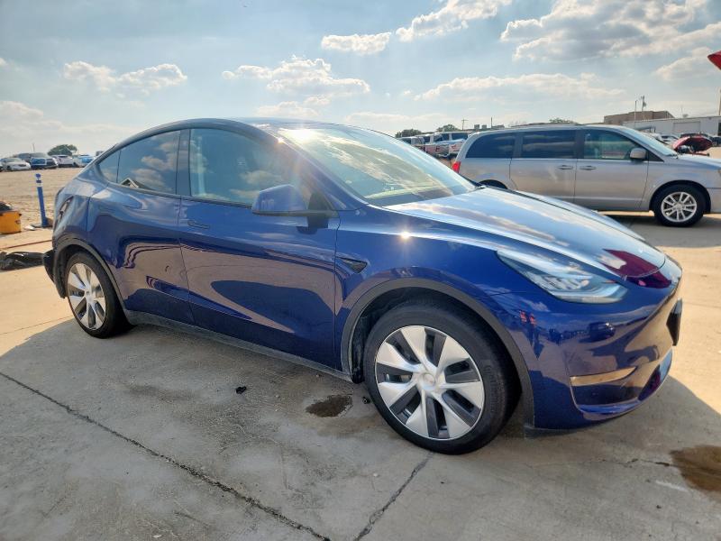 7SAYGDEE1PA088353 - 2023 TESLA MODEL Y ლურჯი ფოტო 4