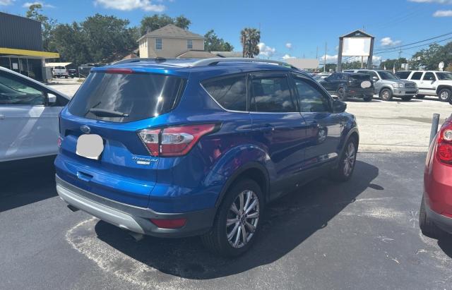 1FMCU9J95HUD95912 - 2017 FORD ESCAPE TITANIUM BLUE photo 4