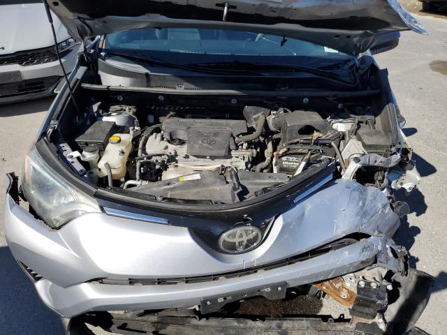 2T3BFREV8JW723043 - 2018 TOYOTA RAV4 LE SILVER photo 11