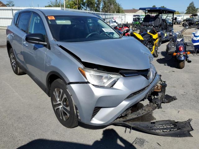 2T3BFREV8JW723043 - 2018 TOYOTA RAV4 LE SILVER photo 4