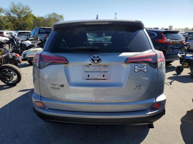 2T3BFREV8JW723043 - 2018 TOYOTA RAV4 LE SILVER photo 6