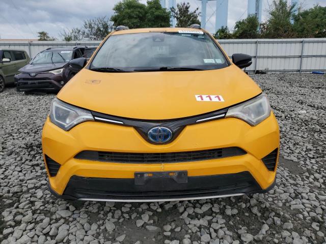 JTMRJREV0JD176571 - 2018 TOYOTA RAV4 HV LE Sarı fotoğraf 5