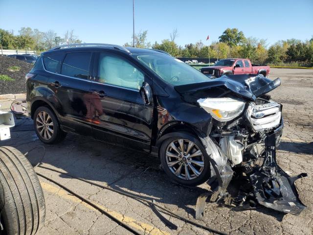1FMCU9J96HUC99433 - 2017 FORD ESCAPE TITANIUM BLACK photo 4