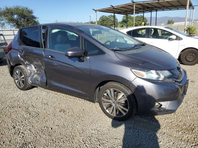 3HGGK5H8XFM713396 - 2015 HONDA FIT EX GRAY photo 4