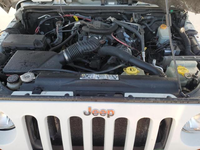 1J4BA5H19BL567318 - 2011 JEEP WRANGLER U SAHARA WHITE photo 11