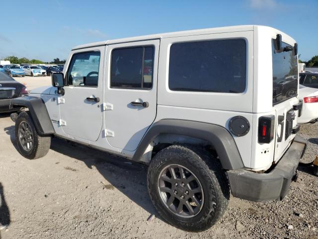 1J4BA5H19BL567318 - 2011 JEEP WRANGLER U SAHARA WHITE photo 2