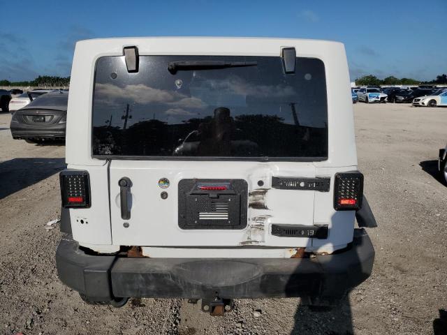 1J4BA5H19BL567318 - 2011 JEEP WRANGLER U SAHARA WHITE photo 6