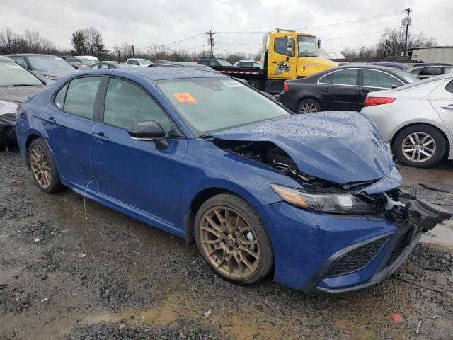 4T1G11AK6RU252077 - 2024 TOYOTA CAMRY SE NIGHT SHADE BLUE photo 4