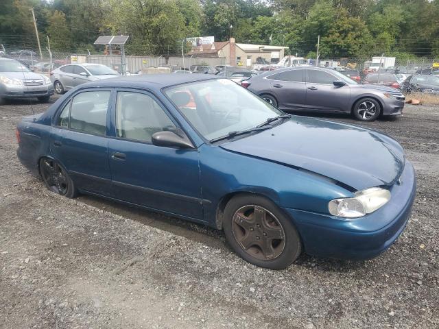 1Y1SK5284XZ409543 - 1999 CHEVROLET GEO PRIZM BASE BLUE photo 4