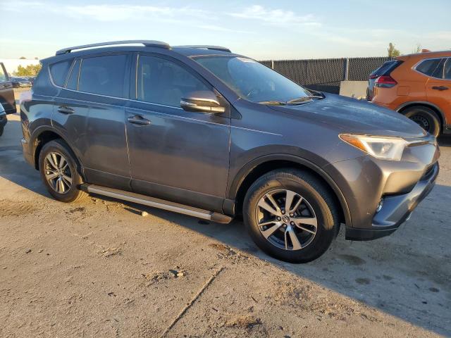 JTMWFREV4HJ133433 - 2017 TOYOTA RAV4 XLE GRAY photo 4