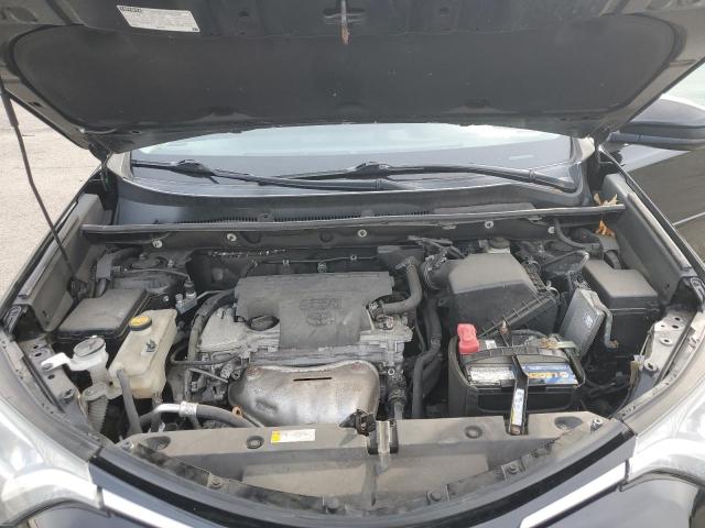 2T3BFREVXJW760188 - 2018 TOYOTA RAV4 LE 黑色 照片 12
