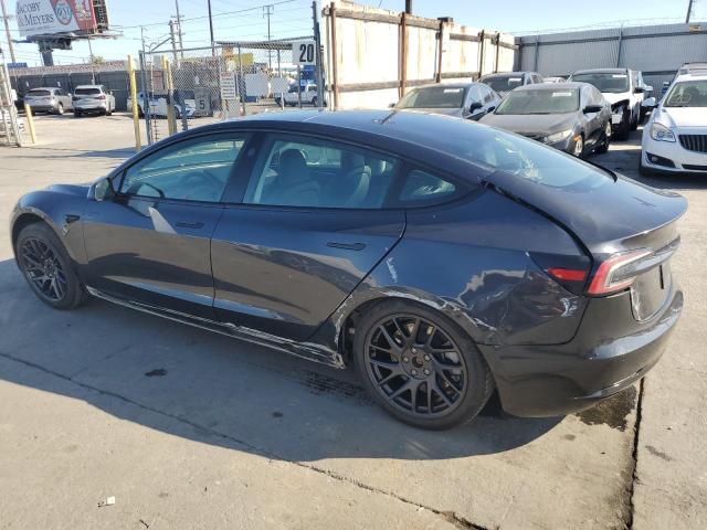 5YJ3E1EA7SF890930 - 2025 TESLA MODEL 3 ნაცრისფერი ფოტო 2