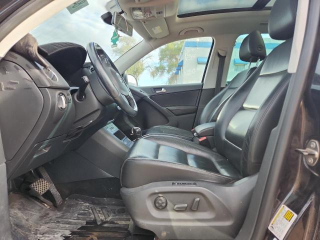 WVGBV7AX2BW513129 - 2011 VOLKSWAGEN TIGUAN S BLACK photo 7