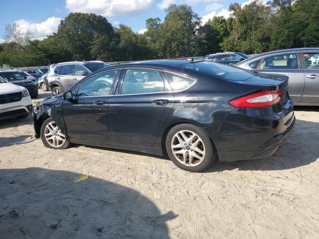 1FA6P0H71F5108300 - 2015 FORD FUSION SE შავი ფოტო 2
