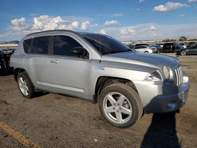 1J4NT5FB1AD641584 - 2010 JEEP COMPASS LIMITED Argent photo 4