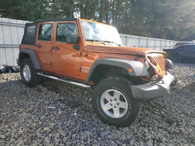 1J4BA3H1XAL175516 - 2010 JEEP WRANGLER UNLIMITED SPORT Қызғылт сары фото 4