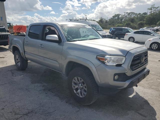 3TMCZ5AN0KM198301 - 2019 TOYOTA TACOMA DOUBLE CAB ვერცხლისფერი ფოტო 4