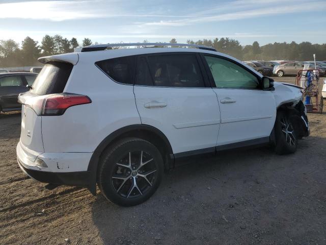 JTMJFREV0GD182376 - 2016 TOYOTA RAV4 SE WHITE photo 3