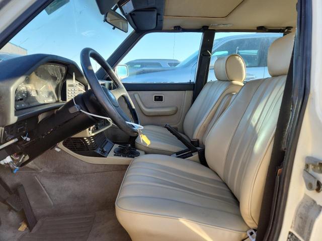 WBADK7307H9652683 - 1987 BMW 528 E WHITE photo 7