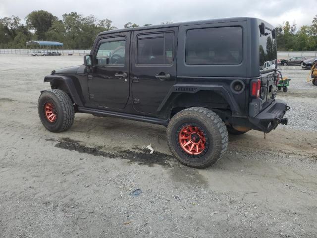 1C4BJWDG1DL522690 - 2013 JEEP WRANGLER U SPORT BLACK photo 2