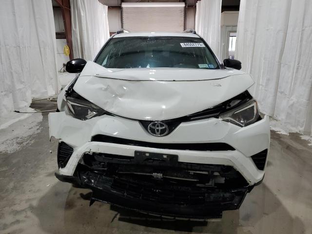 JTMBFREV7GJ063648 - 2016 TOYOTA RAV4 LE WHITE photo 5