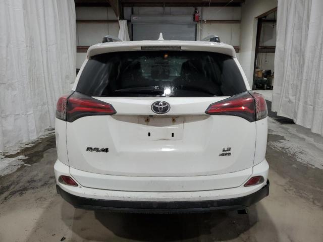 JTMBFREV7GJ063648 - 2016 TOYOTA RAV4 LE WHITE photo 6