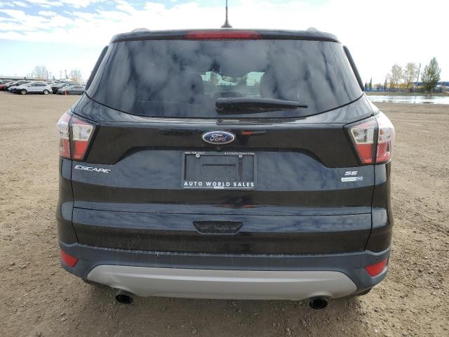 1FMCU9GD3JUC95518 - 2018 FORD ESCAPE SE Schwarz Foto 6