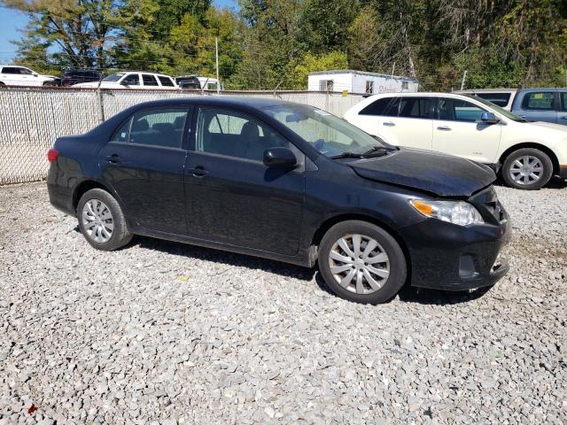 5YFBU4EE2CP013917 - 2012 TOYOTA COROLLA BASE Schwarz Foto 4