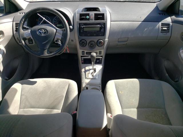 5YFBU4EE2CP013917 - 2012 TOYOTA COROLLA BASE Schwarz Foto 8