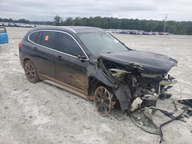 WBXHT3C30H5F67704 - 2017 BMW X1 XDRIVE28I შავი ფოტო 4