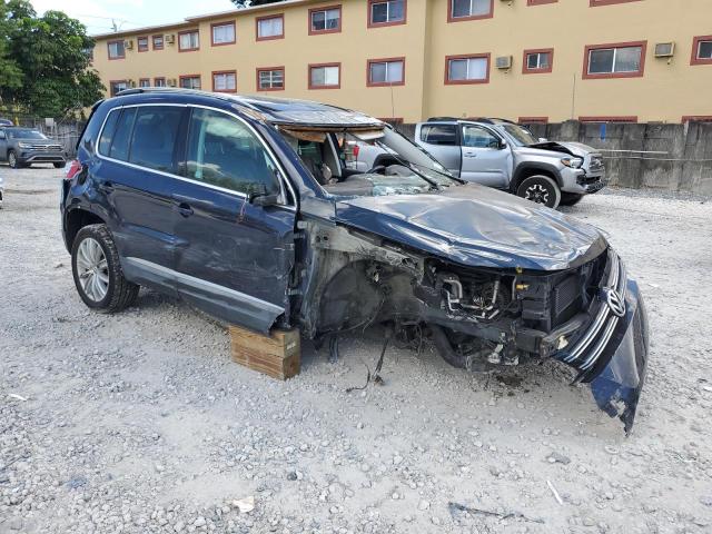 WVGAV7AX0GW563918 - 2016 VOLKSWAGEN TIGUAN S BLUE photo 4