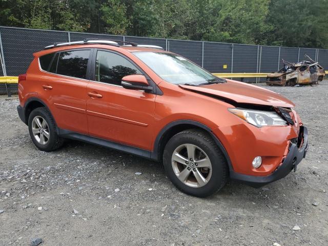 JTMRFREV3FD151978 - 2015 TOYOTA RAV4 XLE ORANGE photo 4