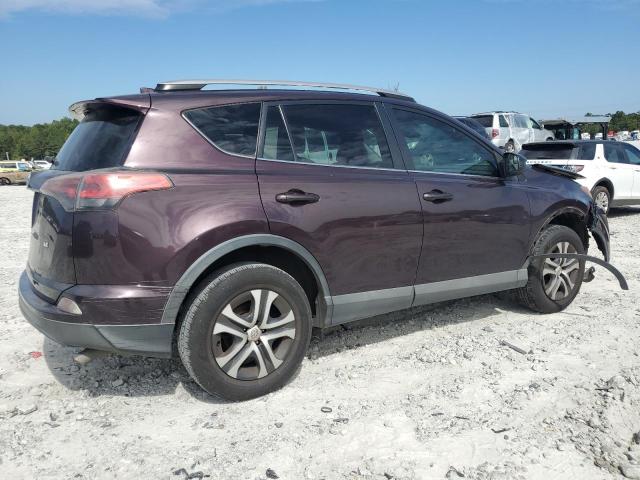 2T3ZFREV9JW439502 - 2018 TOYOTA RAV4 LE Púrpura foto 3