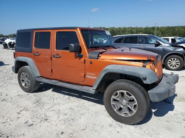 1J4BA3H13BL547439 - 2011 JEEP WRANGLER U SPORT Narıncı foto 4