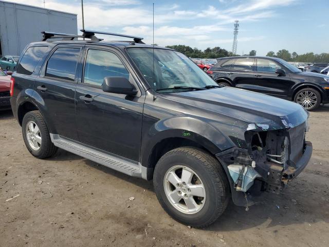 1FMCU0D71BKA75608 - 2011 FORD ESCAPE XLT Schwarz Foto 4