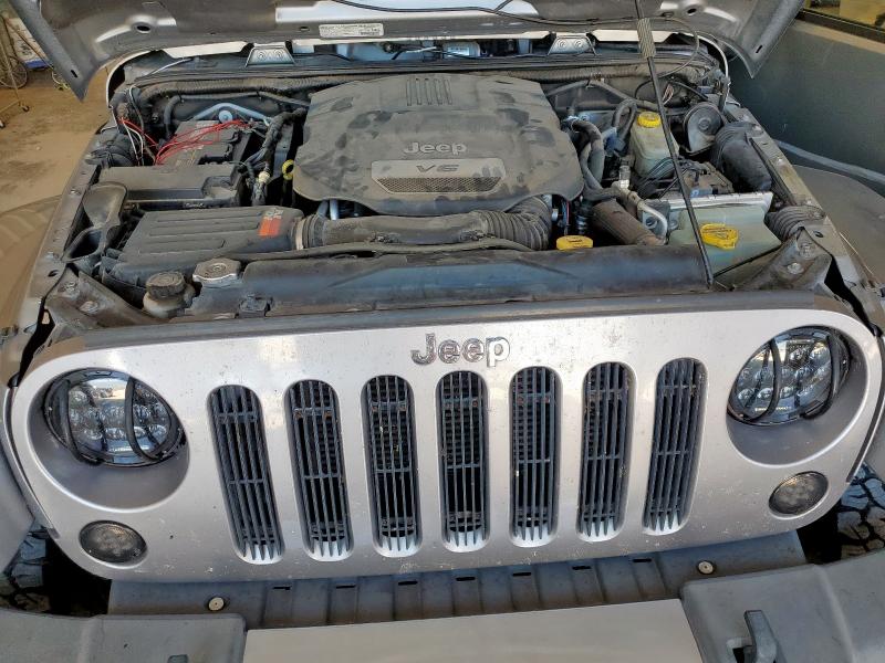1C4BJWEG8EL118933 - 2014 JEEP WRANGLER UNLIMITED SAHARA SILVER photo 12