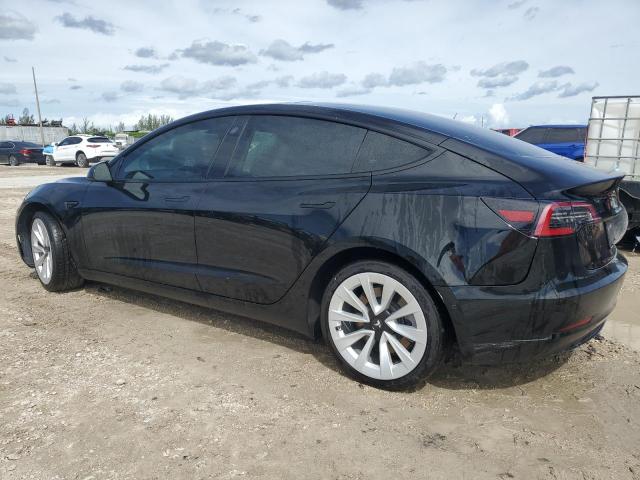 5YJ3E1EB6MF983708 - 2021 TESLA MODEL 3 Schwarz Foto 2